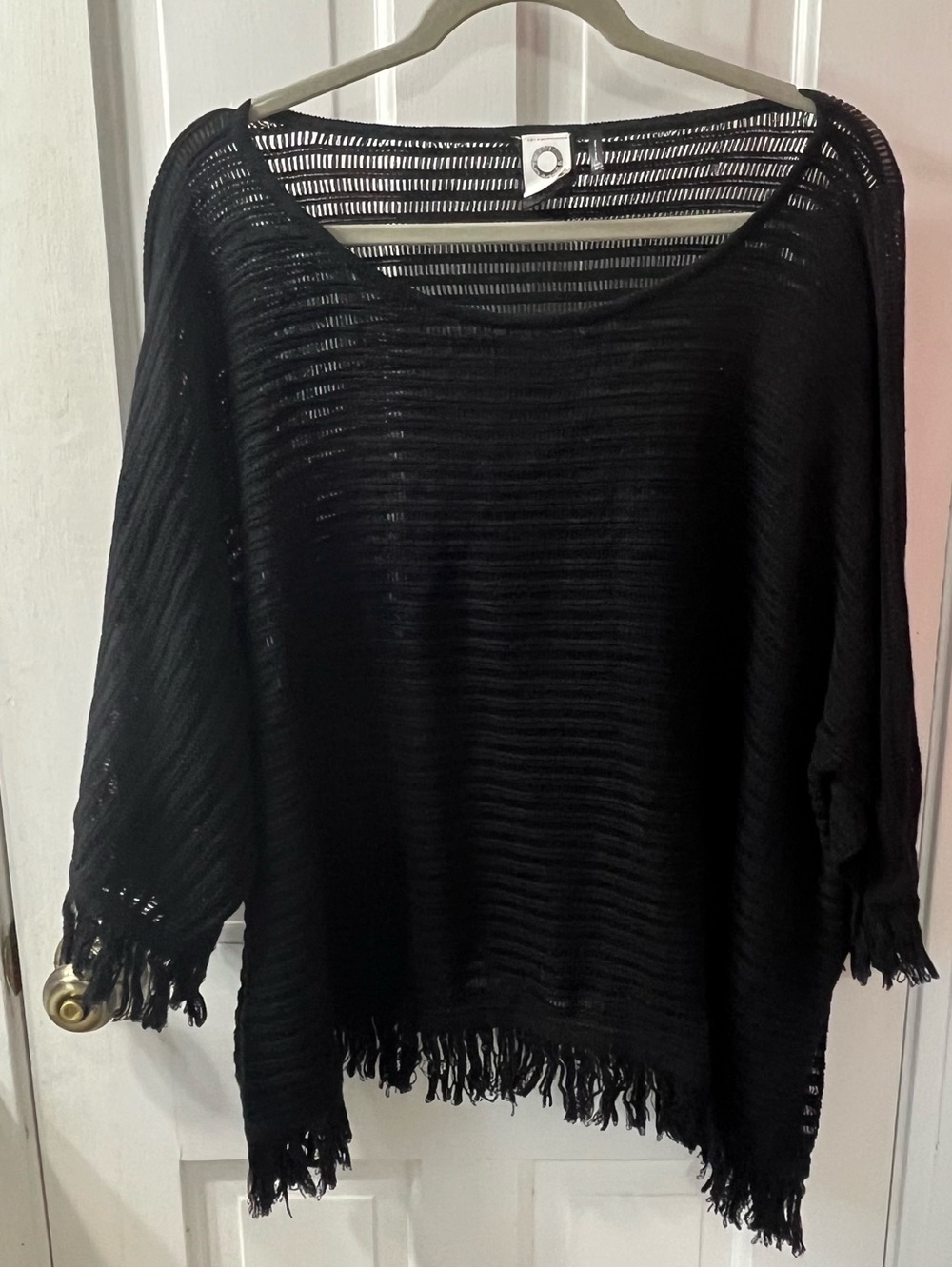 Anthropologie open-stitch fringe poncho sweater. Women’s size Medium